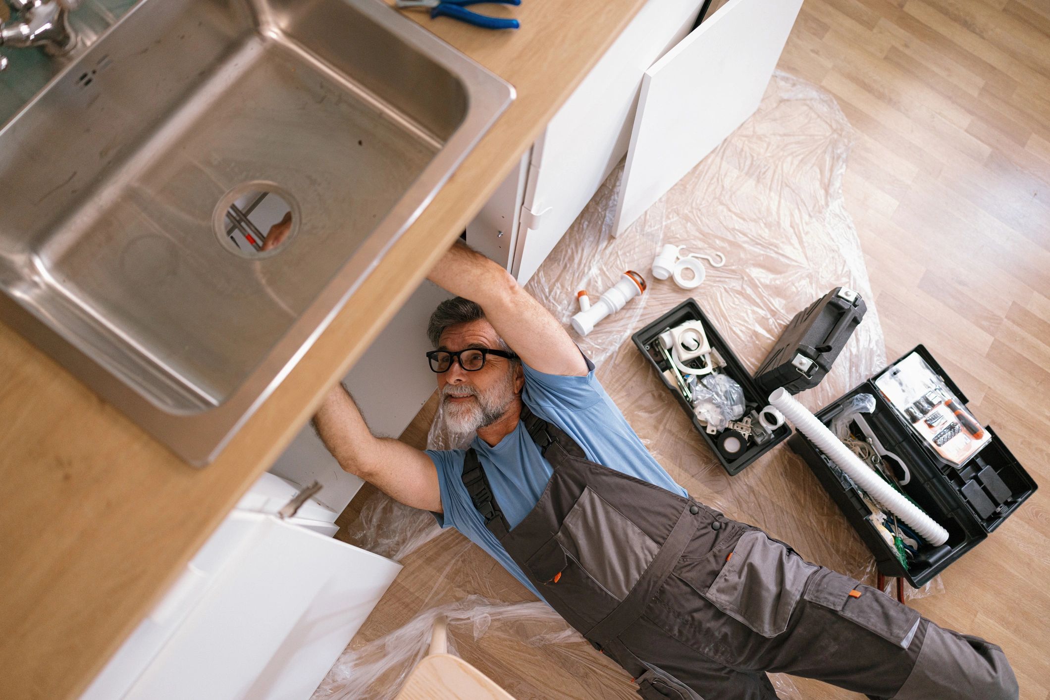 Proline Plumbing team member repairing a pipe